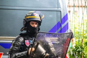 CRS Police Encircling Protest idir hakim photographe paris
